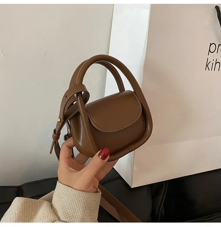 Élan Petite: Eleganz in der Handtasche