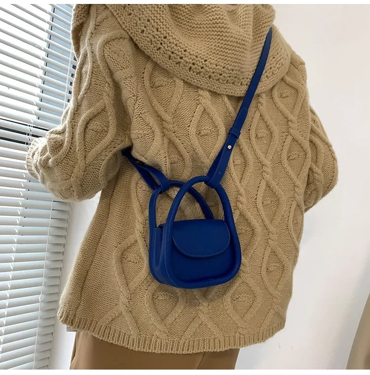 Élan Petite: Eleganz in der Handtasche